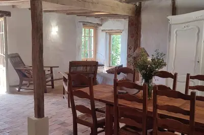 Coin salon dans l'établissement Le cottage des Acacias