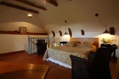 Un ou plusieurs lits dans un hébergement de l'établissement La maison Saluces
