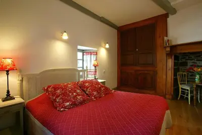 Un ou plusieurs lits dans un hébergement de l'établissement La maison Saluces