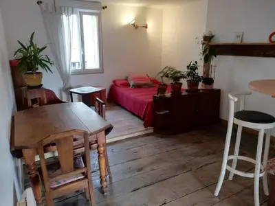 Un ou plusieurs lits dans un hébergement de l'établissement chambre cosy