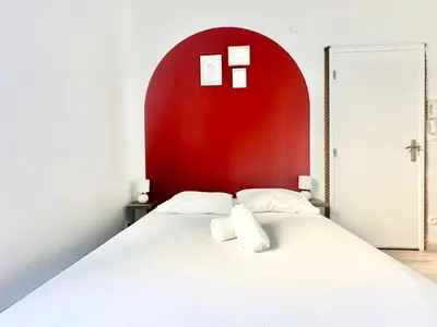 Un ou plusieurs lits dans un hébergement de l'établissement Le Victor, charmant et cosy