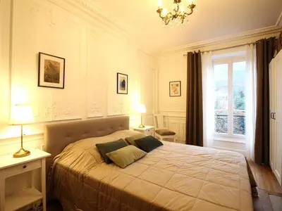 Un ou plusieurs lits dans un hébergement de l'établissement Appartement T2 au Mont-Dore avec Ascenseur et Wifi - FR-1-608-262