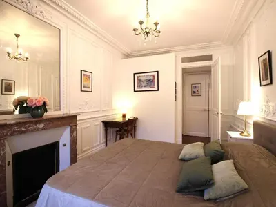 Un ou plusieurs lits dans un hébergement de l'établissement Appartement T2 au Mont-Dore avec Ascenseur et Wifi - FR-1-608-262
