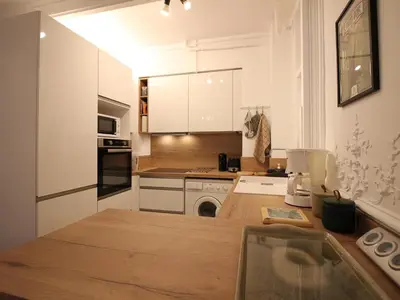 Cuisine ou kitchenette dans l'établissement Appartement T2 au Mont-Dore avec Ascenseur et Wifi - FR-1-608-262