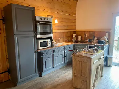 Cuisine ou kitchenette dans l'établissement Chalet vue lac