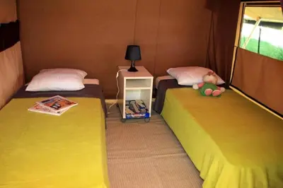 Un ou plusieurs lits dans un hébergement de l'établissement Camping 4 étoiles - Piscine - eed0fi