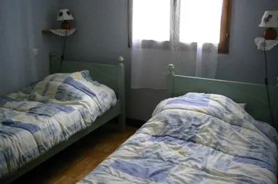 Un ou plusieurs lits dans un hébergement de l'établissement En Périgord Noir paulin maison au calme proche