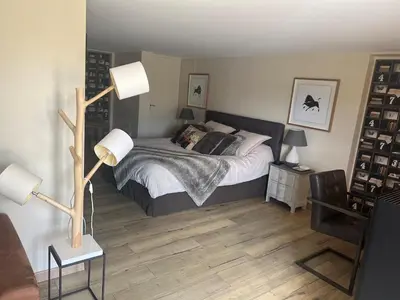 Un ou plusieurs lits dans un hébergement de l'établissement agréable chambre d hôte avec piscine et jacuzzi