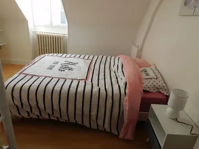 Un ou plusieurs lits dans un hébergement de l'établissement Villa désirée