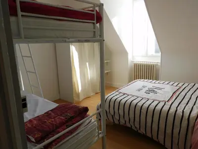 Un ou plusieurs lits dans un hébergement de l'établissement Villa désirée