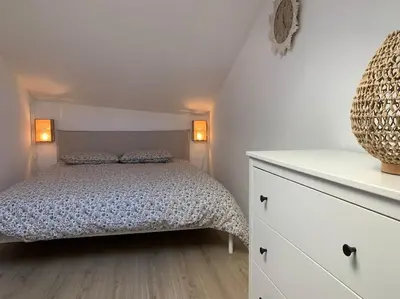 Un ou plusieurs lits dans un hébergement de l'établissement Superbe duplex hypercentre dans une rue piétonne