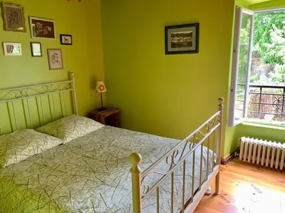 Un ou plusieurs lits dans un hébergement de l'établissement Gîte Les Ferrandaises - Puy de Dôme - Massif du Sancy