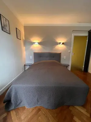 Un ou plusieurs lits dans un hébergement de l'établissement Maison Meublée Montignac-Lascaux