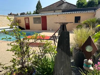 Jardin de l'établissement Chambre dans maison avec piscine