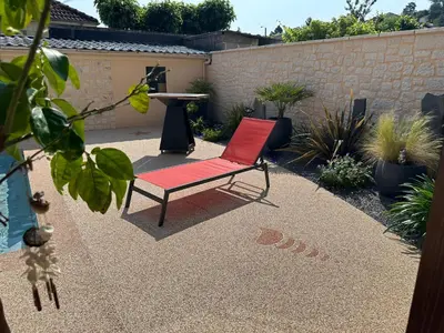 Jardin de l'établissement Chambre dans maison avec piscine