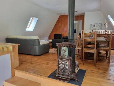 Coin salon dans l'établissement Le Pradima