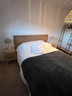 Un ou plusieurs lits dans un hébergement de l'établissement Logement Romily avec vue Montagne