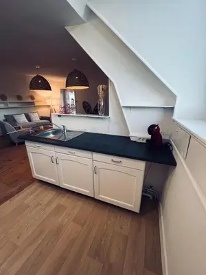 Cuisine ou kitchenette dans l'établissement Logement Romily avec vue Montagne