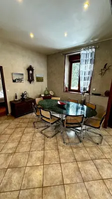 Coin salon dans l'établissement L'école du Hameau 9pers Le Mont Dore