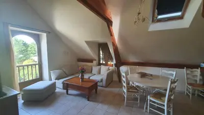 Coin salon dans l'établissement Gîte Bellevue - Domaine de la chapelle en Corrèze