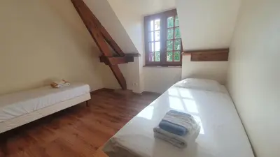 Un ou plusieurs lits dans un hébergement de l'établissement Gîte Bellevue - Domaine de la chapelle en Corrèze