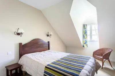Un ou plusieurs lits dans un hébergement de l'établissement Résidence Les Belles Rives - maeva Home - Appartement 2 pièces 7 personnes - Confort MAE-2224
