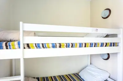 Un ou plusieurs lits dans un hébergement de l'établissement Résidence Les Belles Rives - maeva Home - Appartement 2 pièces 7 personnes - Confort MAE-2224