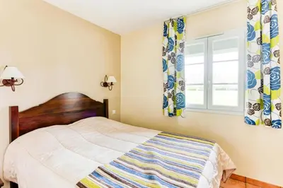 Un ou plusieurs lits dans un hébergement de l'établissement Résidence Les Belles Rives - maeva Home - Appartement 2 Pièces 5 Personnes - Confort MAE-2284