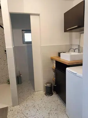 Cuisine ou kitchenette dans l'établissement Chalet au bord du lac