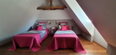 Un ou plusieurs lits dans un hébergement de l'établissement Le Clos d'Ô Maison de charme La Salamandre avec sa piscine chauffée proche de Sarlat
