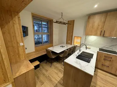 Cuisine ou kitchenette dans l'établissement Le Refuge des Skieurs Le Mont Dore 4/6pers