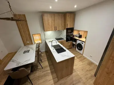 Cuisine ou kitchenette dans l'établissement Le Refuge des Skieurs Le Mont Dore 4/6pers