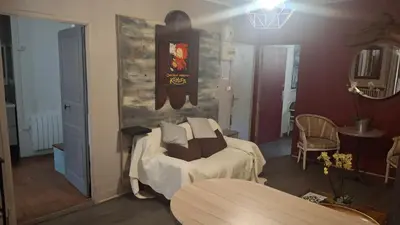 Un ou plusieurs lits dans un hébergement de l'établissement COSY B&B