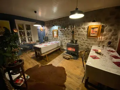 Coin salon dans l'établissement COSY B&B
