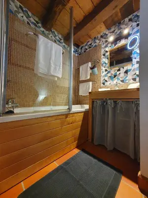 Cuisine ou kitchenette dans l'établissement LA GRANGE
