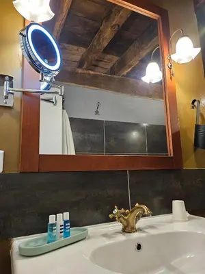 Salle de bains dans l'établissement LA GRANGE