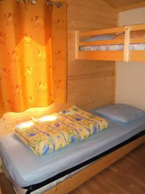 Un ou plusieurs lits dans un hébergement de l'établissement Gîte de France Chalet n°3 - Gîte de France 4 personnes MAE-6494