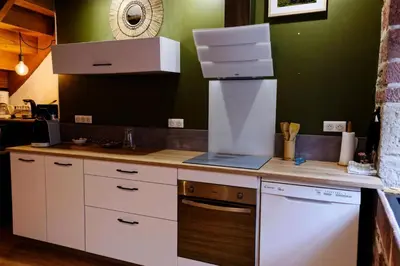 Cuisine ou kitchenette dans l'établissement Gîte de France La bonne 