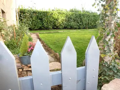 Jardin de l'établissement Gîte de France La maisonnette 3 épis - Gîte de France 4 personnes MAE-6604