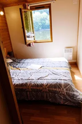 Un ou plusieurs lits dans un hébergement de l'établissement Gîte de France Chalet n°2 - Gîte de France 4 personnes MAE-6644