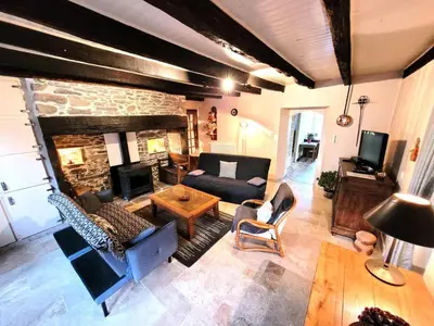 Coin salon dans l'établissement Gîte de France Au bord de l'eau 3 épis - Gîte de France 6 personnes MAE-6674