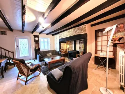 Coin salon dans l'établissement Gîte de France Au bord de l'eau 3 épis - Gîte de France 6 personnes MAE-6674