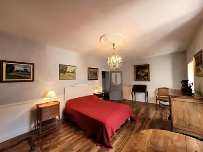 Un ou plusieurs lits dans un hébergement de l'établissement Gîte de France Gîte la chapelle 3 épis - Gîte de France 6 personnes MAE-8904