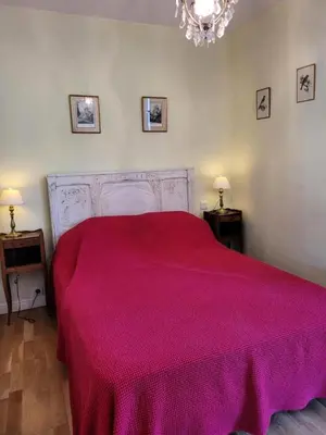 Un ou plusieurs lits dans un hébergement de l'établissement Gîte de France Gîte la chapelle 3 épis - Gîte de France 6 personnes MAE-8904