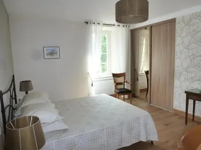 Un ou plusieurs lits dans un hébergement de l'établissement Gîte de France Chez le fustier 4 épis - Gîte de France 6 personnes MAE-8924