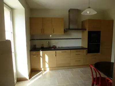Cuisine ou kitchenette dans l'établissement Gîte de France Chez le fustier 4 épis - Gîte de France 6 personnes MAE-8924