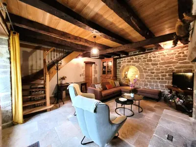 Coin salon dans l'établissement Gîte de France Les 7 sources 3 épis - Gîte de France 8 personnes MAE-8954