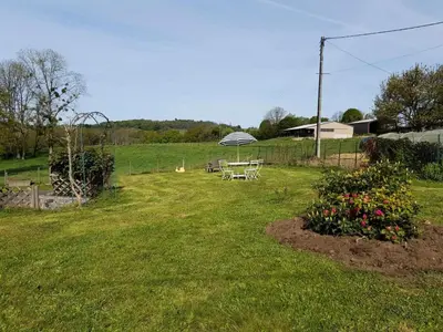 Jardin de l'établissement Gîte de France O'calm 3 épis - Gîte de France 4 personnes MAE-9014