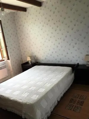Un ou plusieurs lits dans un hébergement de l'établissement Gîte de France à Saint-Exupéry-les-Roches 3 épis - Gîte de France 6 personnes MAE-9064