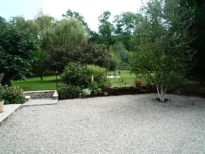 Jardin de l'établissement Gîte de France Les hauts de la valade 3 épis - Gîte de France 4 personnes MAE-9084